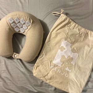 Kanjo acupressure travel neck pillow.